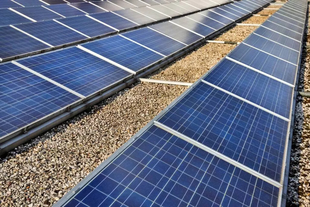 modern solar cell system on flat roof with built up roofing or BUR